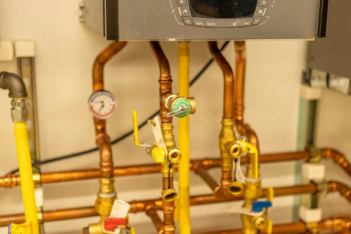 Licensed technician providing Water Heater Installation for a homeowner in St. Michael